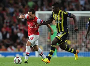 Arsenal V Fenerbahce 2013-14 Prints: Santi Cazorla Outmaneuvers Emmanuel Emenike: Arsenal vs Fenerbahce UEFA Champions League Play-offs