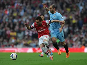 Arsenal V Manchester City 2013/14 Prints: Santi Cazorla Outmaneuvers Pablo Zabaleta: Arsenal vs Manchester City