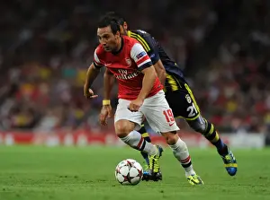 Santi Cazorla Outmaneuvers Selcuk Sahin in Arsenal's UEFA Champions League Clash