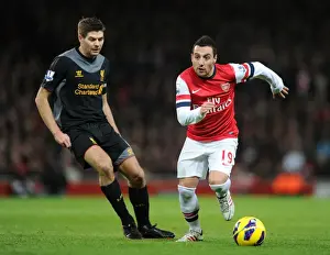 Arsenal V Liverpool 2012-13 Prints: Santi Cazorla Outmaneuvers Steven Gerrard: Arsenal vs. Liverpool, Premier League, 2012-13