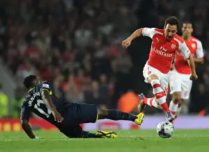 Arsenal V Southampton, League Cup 2014/15 Prints: Santi Cazorla Outmaneuvers Victor Wanyama: Arsenal vs Southampton, League Cup 2014/15