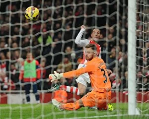Images Dated 13th December 2014: Santi Cazorla Scores Arsenal's Third Goal vs. Newcastle United (December 2014)