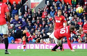 Images Dated 3rd November 2012: Santi Cazorla Scores Stunner Past Wayne Rooney: Manchester United vs