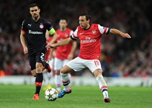 Arsenal V Olympiacos 2012-13 Prints: Santi Cazorla vs. Giannis Maniatis: Arsenal FC vs