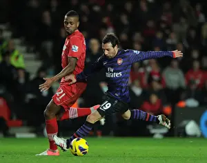Southampton V Arsenal 2012-13 Prints: Santi Cazorla vs Guly Do Prado: Shielding the Ball in the Southampton v Arsenal Clash (2012-13)
