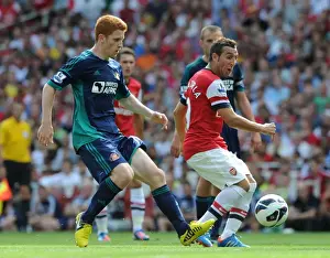 Arsenal V Sunderland 2012-13 Prints: Santi Cazorla vs Jack Colback: Intense Battle in Arsenal v Sunderland Premier League Clash
