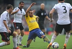 Images Dated 24th August 2013: Santi Cazorla vs. Kacaniklic and Riise: Fulham vs. Arsenal, Premier League 2013-14