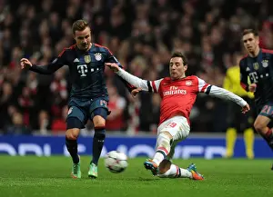 Arsenal V Bayern Munich 2013-14 Prints: Santi Cazorla vs. Mario Gotze: Arsenal Star Fends Off Bayern's Pressure in Champions League Clash