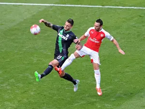 Arsenal V Stoke City 2015-16 Prints: Santi Cazorla vs. Mato Joselu: Intense Battle in Arsenal's Victory over Stoke City