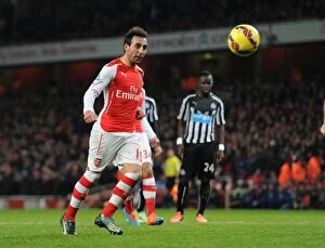 Arsenal v Newcastle United 2014/15 Collection: Santi Cazorla's Double from Penalty Spots: Arsenal's Victory over Newcastle United