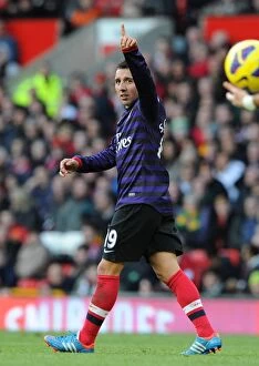 Images Dated 3rd November 2012: Santi Cazorla's Epic Goal: Arsenal's Triumph Over Manchester United (Premier League 2012-13)