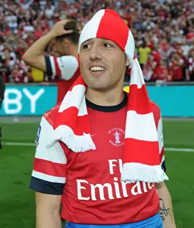 Santi Cazorla's FA Cup Triumph: Arsenal's Victory Celebration at Wembley Stadium