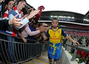 Santi Cazorla's Triumphant FA Cup Celebration: Arsenal's Victory over Aston Villa