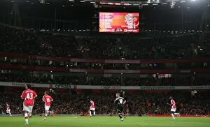 The scoreboard shows the Arsenal starting line up