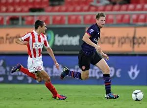 Olympiacos U19 V Arsenal U19 - NextGen 2012:13 Prints: Sead Hajrovic Outpaces Dimitris Rikspun in NextGen Series Clash between Olympiacos and Arsenal