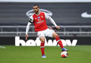 Sead Kolasinac of Arsenal Faces Off Against Tottenham Hotspur in Premier League Clash (2019-20)