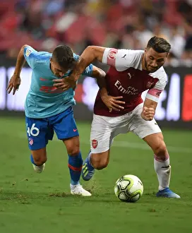 Arsenal V Atletico Madrid 2018-19 Prints: Sead Kolasinac vs. Oscar Pinchi: Clash at the International Champions Cup 2018 between Arsenal and Atletico Madrid