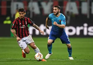 AC Milan V Arsenal 2017-18 Prints: Sead Kolasinac vs Suso: A Footballing Battle at the San Siro - Arsenal vs AC Milan