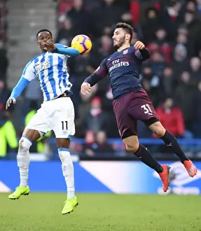 Sead Kolasinac vs Tom Ince: Intense Battle in Huddersfield Town vs Arsenal FC Premier League Clash