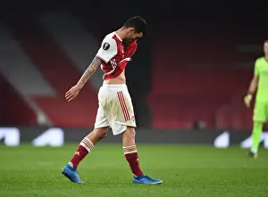 Arsenal V Olympiacos 2020-21 Prints: Empty Seats Battle: Arsenal vs Olympiacos at the Ghostly Emirates Stadium - Europa League Round of 16