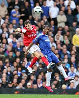 Squillaci Sebastien Collection: Sebastien Squillaci (Arsenal) Didier Drogba (Chelsea). Chelsea 2: 0 Arsenal