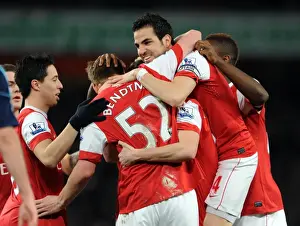 Sebastien Squillaci celebrates scoring for Arsenal with his team mates including Cesc Fabregas