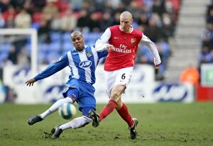 Images Dated 10th March 2008: Senderos vs. King: Stalemate at JJB Stadium - Arsenal vs. Wigan, Barclays Premier League, 2008