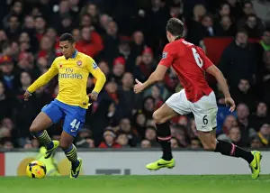 Manchester United V Arsenal 2013-14 Prints: Serge Gnabry Charges Past Jonny Evans: Manchester United vs