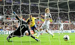 Swansea Prints: Serge Gnabry Scores First Arsenal Goal Against Swansea City: Strikes Past Michel Vorm