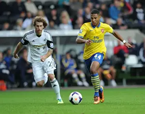 Swansea Prints: Serge Gnabry vs Jose Canas: A Premier League Battle at Swansea City
