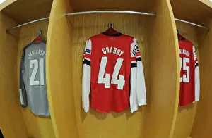 Arsenal V Bayern Munich 2013-14 Prints: Serge Gnabry's Arsenal Jersey Hangs in Emirates Stadium Ahead of Bayern Munich Clash