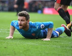 Images Dated 14th January 2018: Shkodran Mustafi: Focused on the Ball at AFC Bournemouth vs Arsenal (2017-18)
