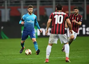 AC Milan V Arsenal 2017-18 Prints: Shkodran Mustafi Focuses in AC Milan vs Arsenal Europa League Clash