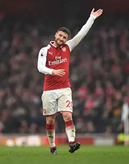 Arsenal V Tottenham Hotspur 2017-18 Prints: Shkodran Mustafi Focuses in Arsenal-Tottenham Rivalry (Arsenal v Tottenham Hotspur 2017-18)