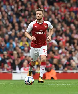 Arsenal V Brighton And Hove Albion 2017-18 Prints: Shkodran Mustafi Focuses in Arsenal's Battle Against Brighton & Hove Albion (2017-18)