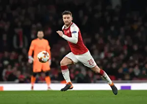 Arsenal V AC Milan 2017-18 Prints: Shkodran Mustafi Focuses in Arsenal's Europa League Battle against AC Milan