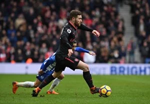 Images Dated 4th March 2018: Shkodran Mustafi Focuses in Arsenal's Premier League Clash Against Brighton & Hove Albion