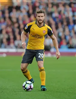 Burnley V Arsenal 2016-17 Prints: Shkodran Mustafi: Intense Focus Amidst Burnley vs Arsenal Premier League Battle (2016-17)