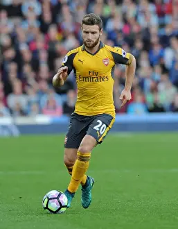 Burnley V Arsenal 2016-17 Prints: Shkodran Mustafi: Intense Focus in Burnley vs Arsenal Premier League Clash (2016-17)