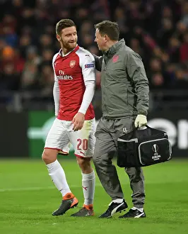 CSKA Moscow V Arsenal 2017-18 Prints: Shkodran Mustafi Receives Treatment from Arsenal Physio Colin Lewin during CSKA Moscow vs Arsenal UEFA Europa League
