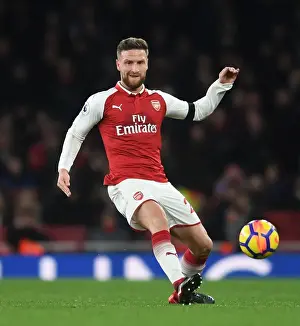 Arsenal V Huddersfield Town 2017-18 Prints: Shkodran Mustafi's Unwavering Concentration: Arsenal's Triumph Over Huddersfield Town