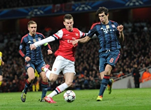 Arsenal V Bayern Munich 2013-14 Prints: Showdown in the Champions League: Koscielny vs