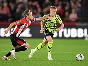 Brentford V Arsenal - Carabao Cup 2023-24 Prints: Showdown at Gtech Community Stadium: Zinchenko vs