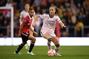 Manchester United Women V Arsenal Women 2022-23 Prints: Showdown in the Women's Super League: Lia Walti Fights for Arsenal Against Manchester United