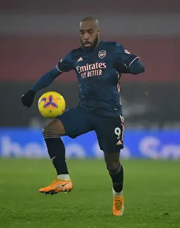 Silent Struggle: Lacazette at Empty Southampton Stadium (2020-21) - A Premier League Match Amidst the Pandemic
