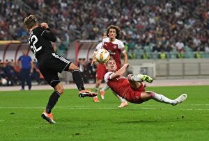 Images Dated 4th October 2018: Smith Rowe vs Jeznicak: Intense Moment in Qarabag vs Arsenal UEFA Europa League Clash
