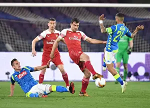 Napoli V Arsenal 2018-19 Prints: Sokratis Faces Off Against Milik and Chiriches in Intense Napoli vs