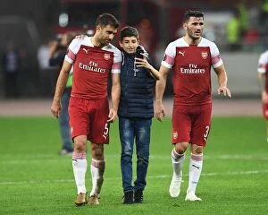 Images Dated 4th October 2018: Sokratis Poses with Fans after Qarabag vs. Arsenal Europa League Match