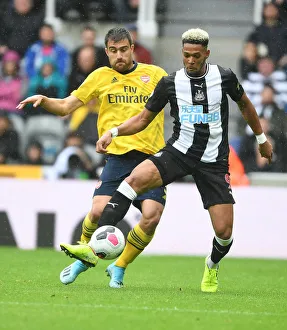Newcastle United V Arsenal 2019-20 Prints: Sokratis vs Joelinton: A Premier League Showdown at St. James Park