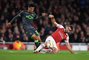 Arsenal V Sporting Clube De Portugal 2018-19 Prints: Sokratis vs. Montero: Clash in the Europa League Between Arsenal and Sporting CP